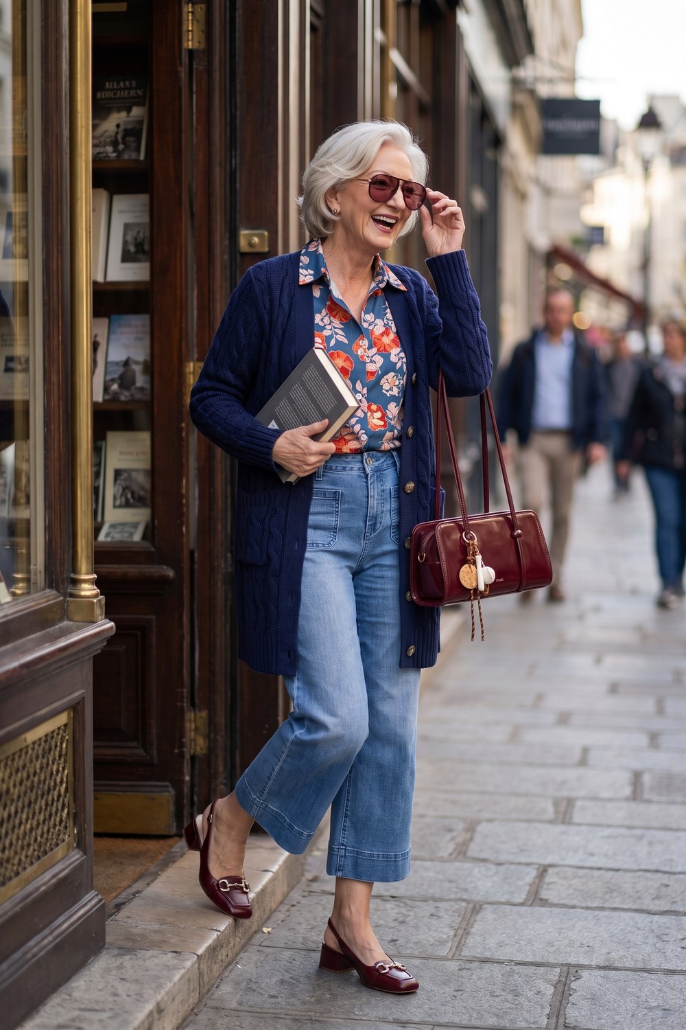 Cropped wide-leg jeans with a floral shirt, long navy cardigan and burgundy slingback flats